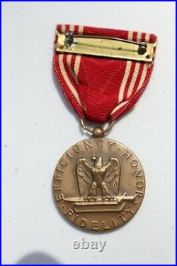 Original WWII U. S. ARMY GOOD CONDUCT MEDAL & RIBBON, named