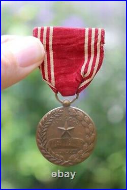 Original WWII U. S. ARMY GOOD CONDUCT MEDAL & RIBBON, named