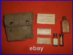 U. S. ARMYVINTAGE 1945 WWII Jungle First Aid Kit with a few Original Medic Items