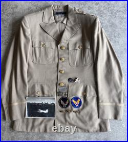 Vintage WWII U. S. Army Air Forces Uniform Jacket with Pins Patches Dog Tags Photo