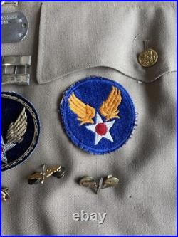 Vintage WWII U. S. Army Air Forces Uniform Jacket with Pins Patches Dog Tags Photo