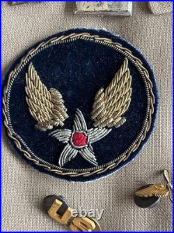 Vintage WWII U. S. Army Air Forces Uniform Jacket with Pins Patches Dog Tags Photo