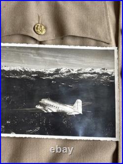Vintage WWII U. S. Army Air Forces Uniform Jacket with Pins Patches Dog Tags Photo