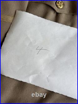 Vintage WWII U. S. Army Air Forces Uniform Jacket with Pins Patches Dog Tags Photo