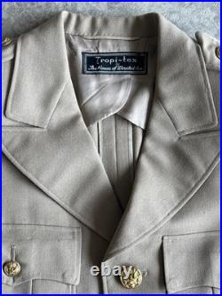 Vintage WWII U. S. Army Air Forces Uniform Jacket with Pins Patches Dog Tags Photo