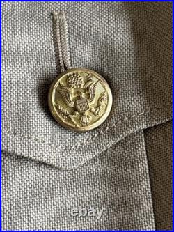 Vintage WWII U. S. Army Air Forces Uniform Jacket with Pins Patches Dog Tags Photo