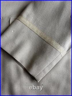 Vintage WWII U. S. Army Air Forces Uniform Jacket with Pins Patches Dog Tags Photo