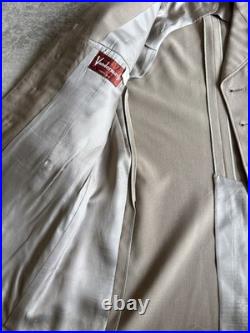 Vintage WWII U. S. Army Air Forces Uniform Jacket with Pins Patches Dog Tags Photo