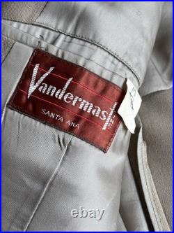 Vintage WWII U. S. Army Air Forces Uniform Jacket with Pins Patches Dog Tags Photo